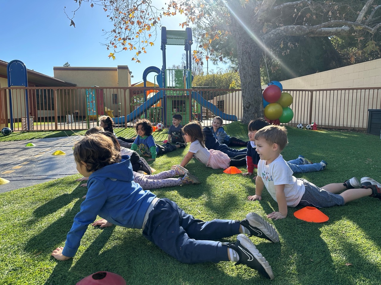 Engaged students exploring hands-on activities at preschool aliso viejo